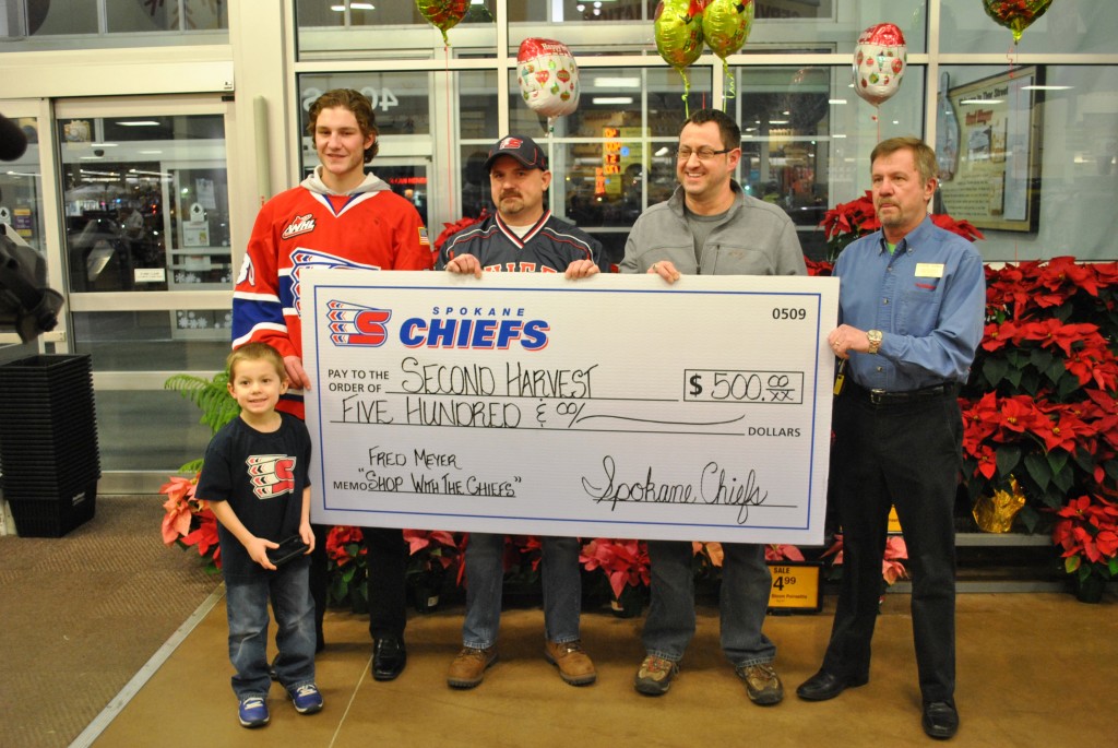 FRED MEYER WINNER CASHES IN, HELPS DONATE 500 TO SECOND HARVEST