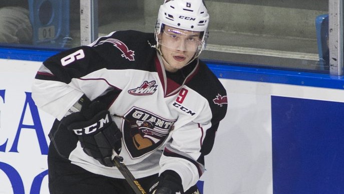 Vancouver Giants defenceman Dylan Plouffe has a look as he makes a play.