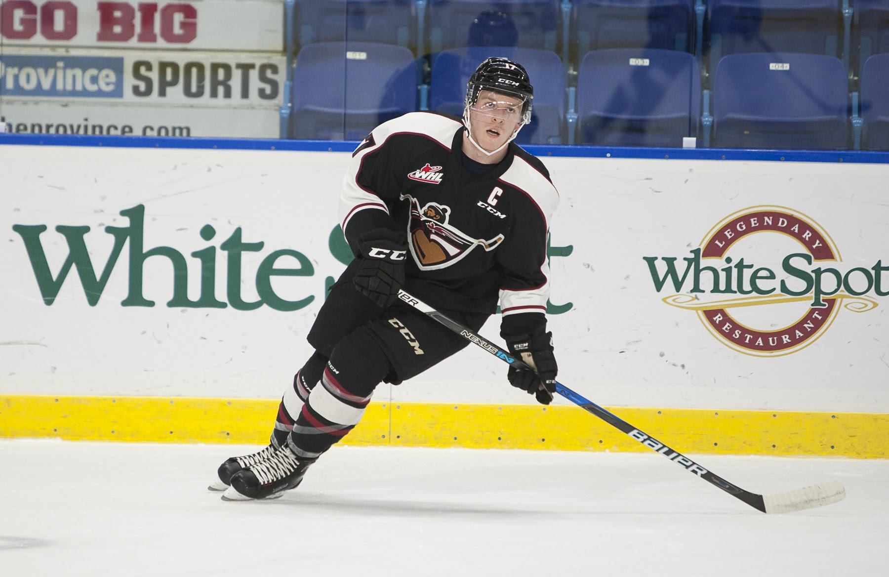 Vancouver Giants captain Tyler Benson looks to make a play up ice.