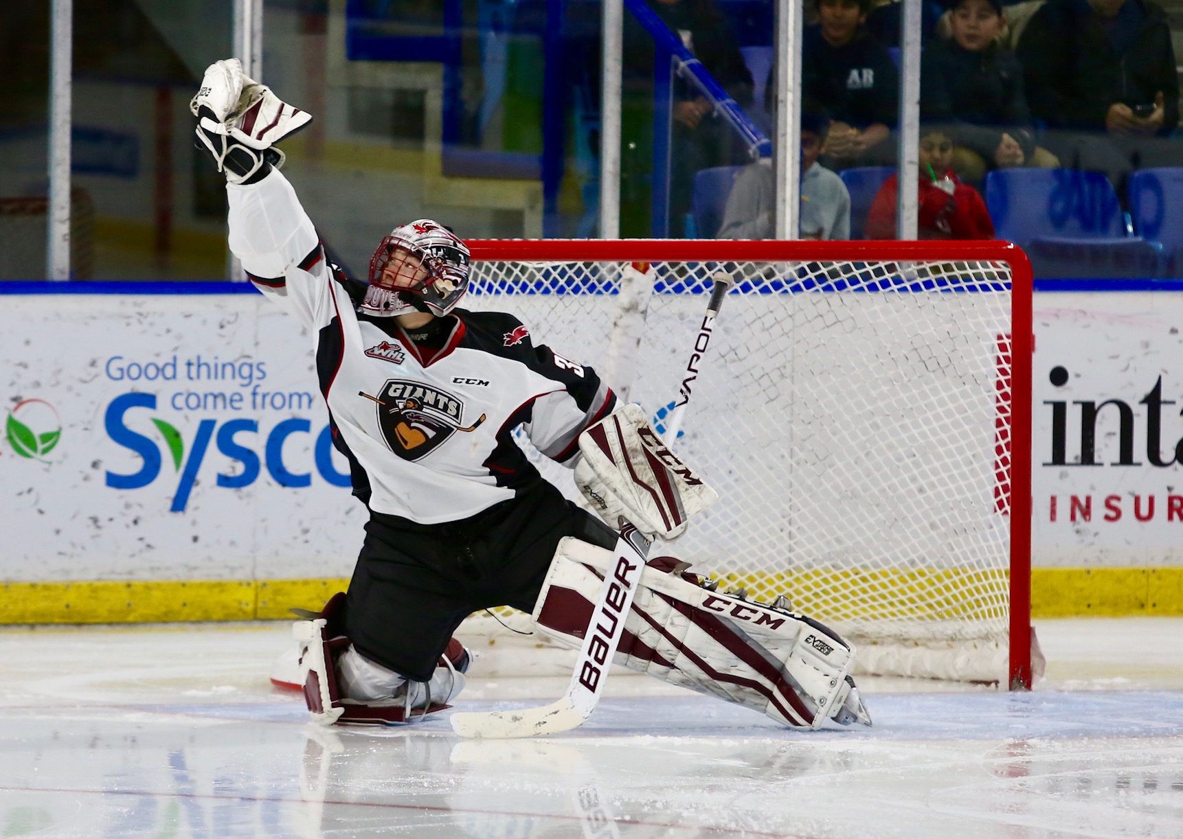 Giants Goaltender David Tendeck makes one of his 31 saves in a 4-2 home ice victory Wednesday against Red Deer