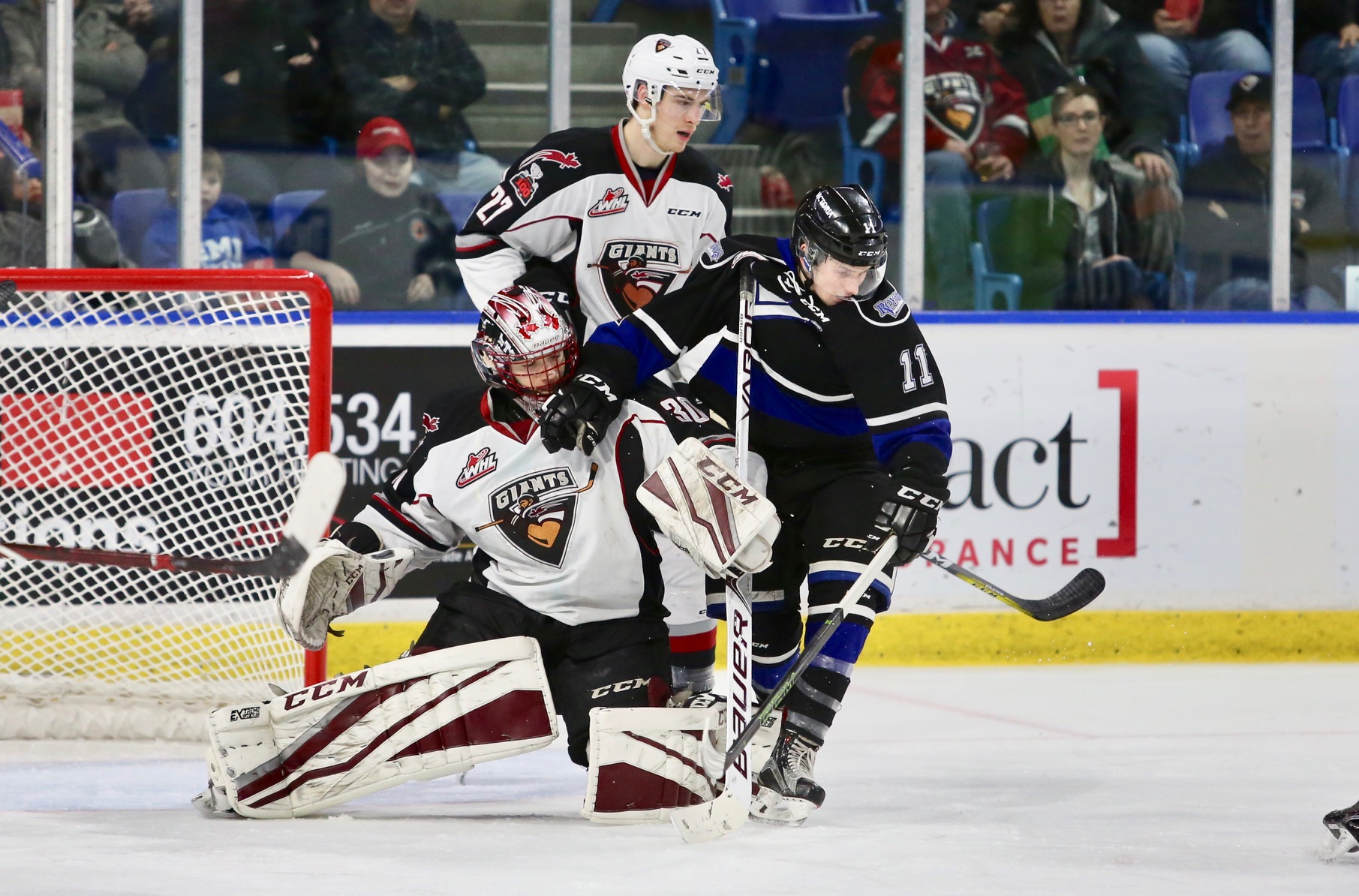 The Vancouver Giants protect the front of their net