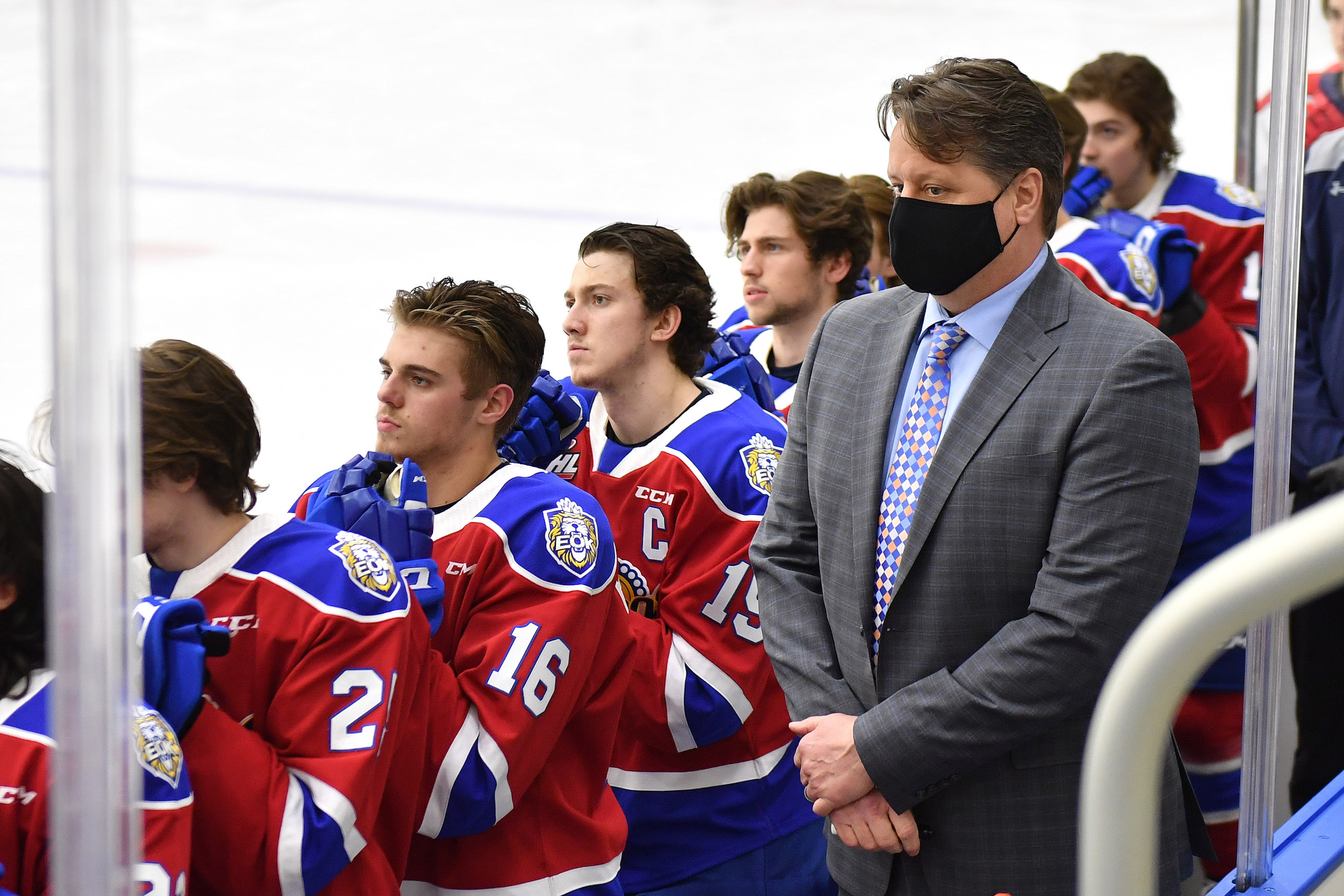 Edmonton Oil Kings coach Brad Lauer on the bench for the anthem