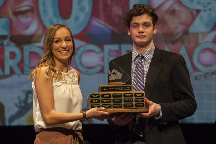 KELOWNA, BC - MARCH 17: Allie Siegmann of Western Star R James Management Group presents Mark Liwiski #9 of the Kelowna Rockets with the Most Improved Player award at the annual Kelowna Rockets awards ceremony at Kelowna Community Theatre on March 17, 2019 in Kelowna, Canada. (Photo by Marissa Baecker/Shoot the Breeze)