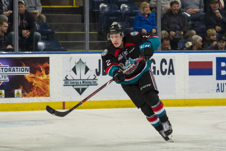 KELOWNA, CANADA - DECEMBER 5: Lassi Thomson #2 of the Kelowna Rockets passes the puck against the Tri-City Americans on December 5, 2018 at Prospera Place in Kelowna, British Columbia, Canada. (Photo by Marissa Baecker/Shoot the Breeze)
