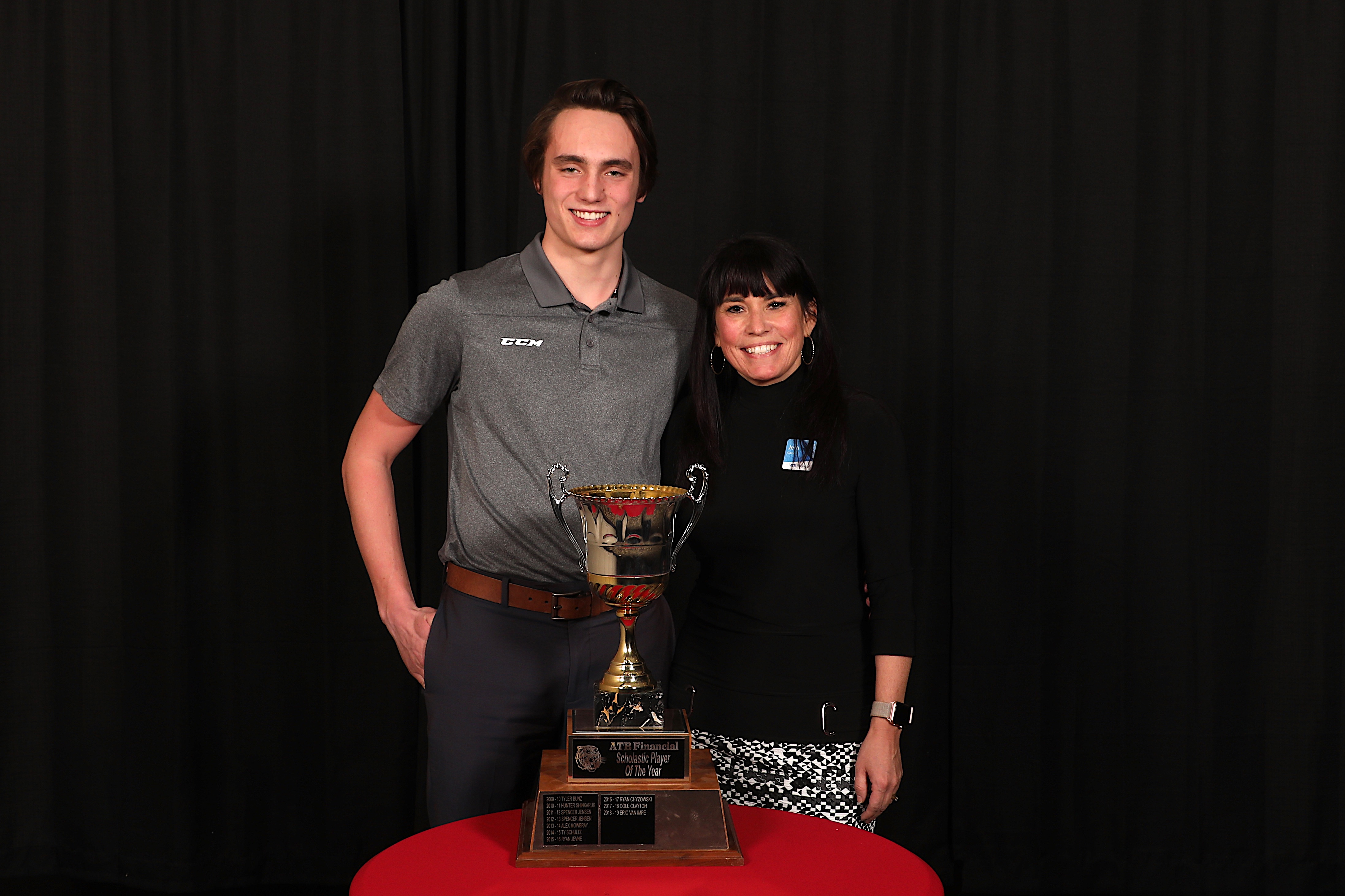 Jerri Gainer, Branch Manager at ATB Financial presented the ATB Financial Scholastic Player of the Year Award to Eric Van Impe