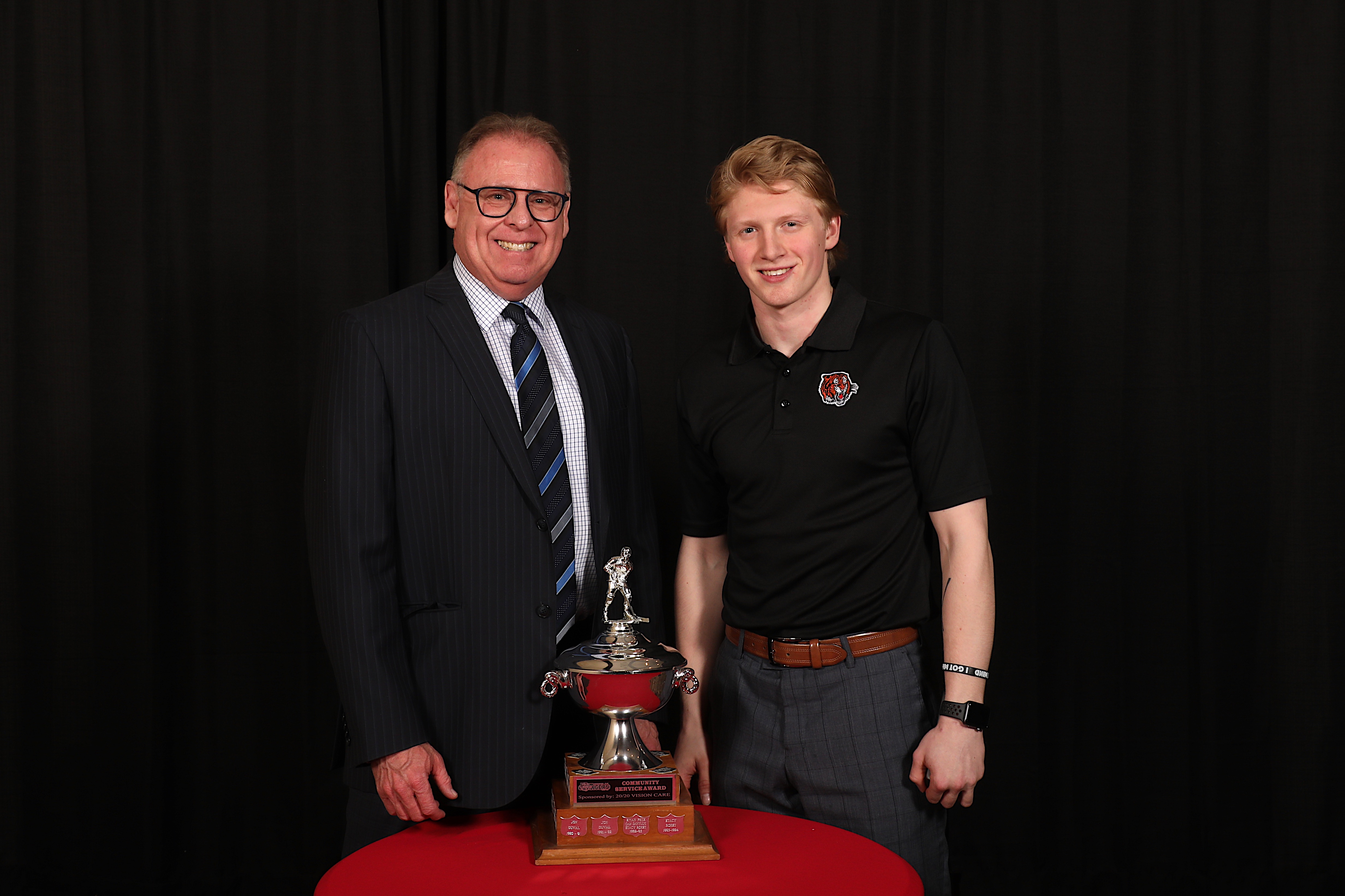 Jim Stewart Presents the 20/20 Vision Care Community Service Award to James Hamblin