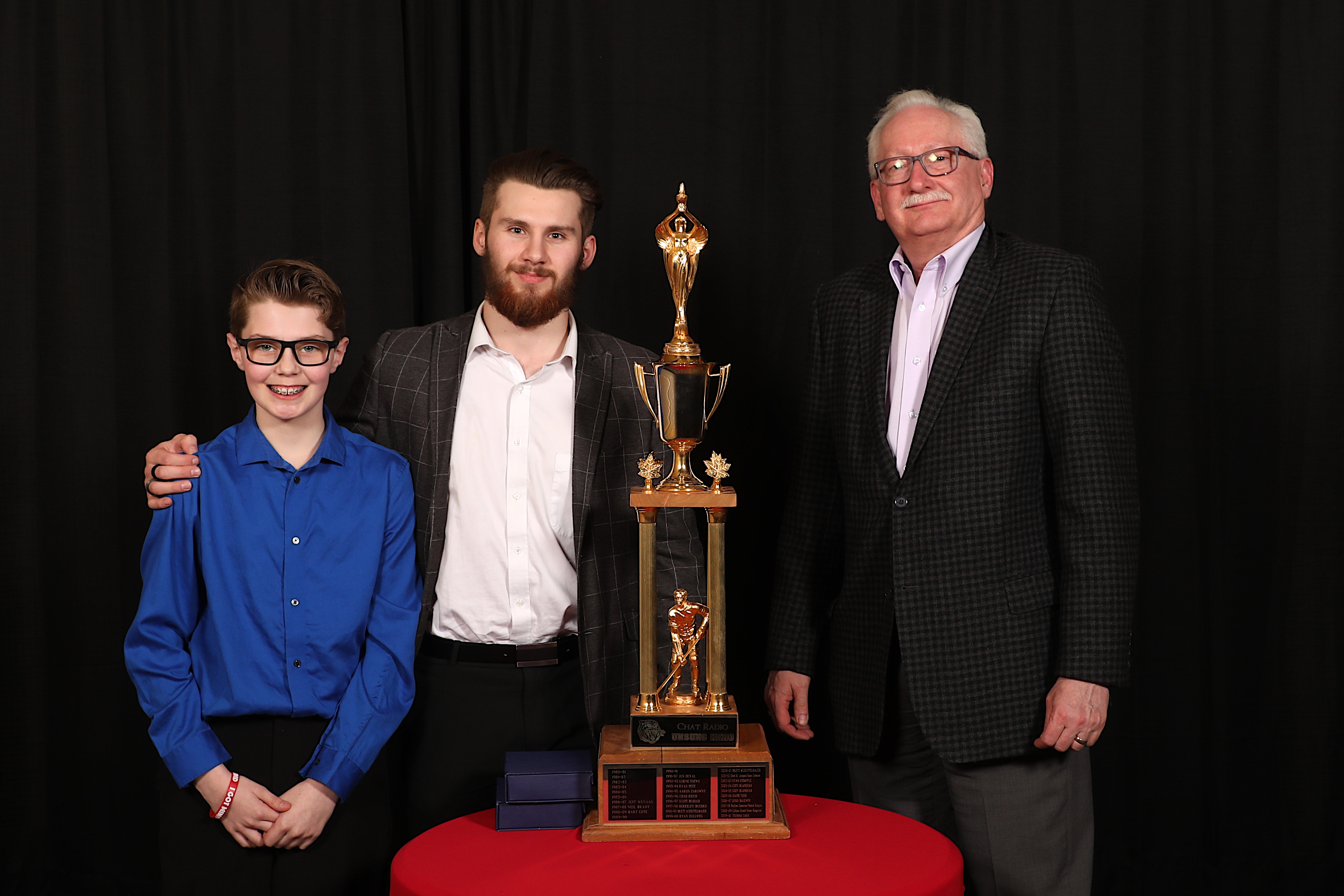 Dave Sherwood of the Jim Pattison Broadcast Group presented Ryan Jevne & Dylan MacPherson with the Chat 94.5 Unsung Hero Award (Landon MacPherson accepted on Dylan's behalf)