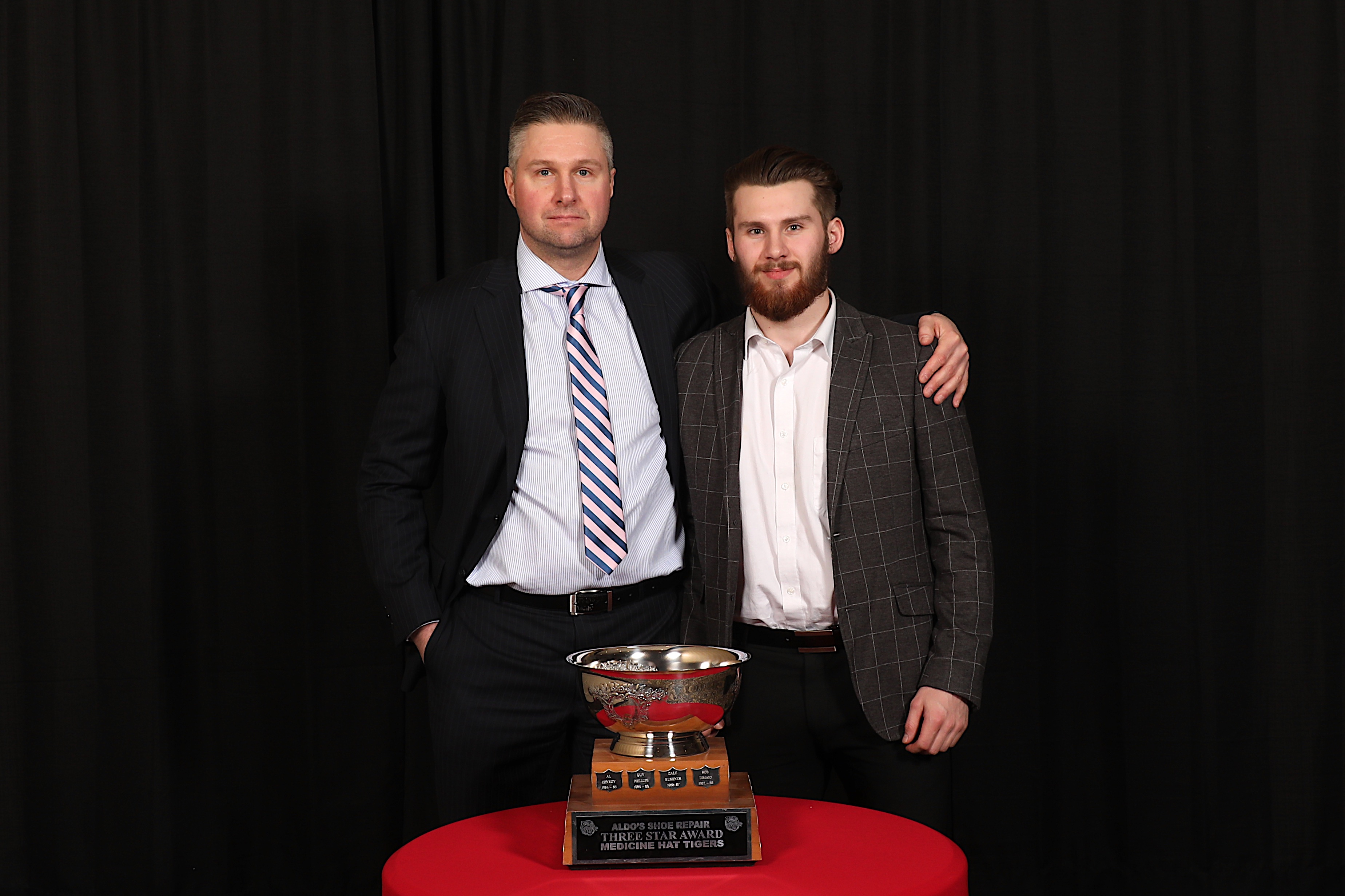 AC Ryan Smith presented Ryan Jevne with the Aldo's Shoe Repair 3 Star Award