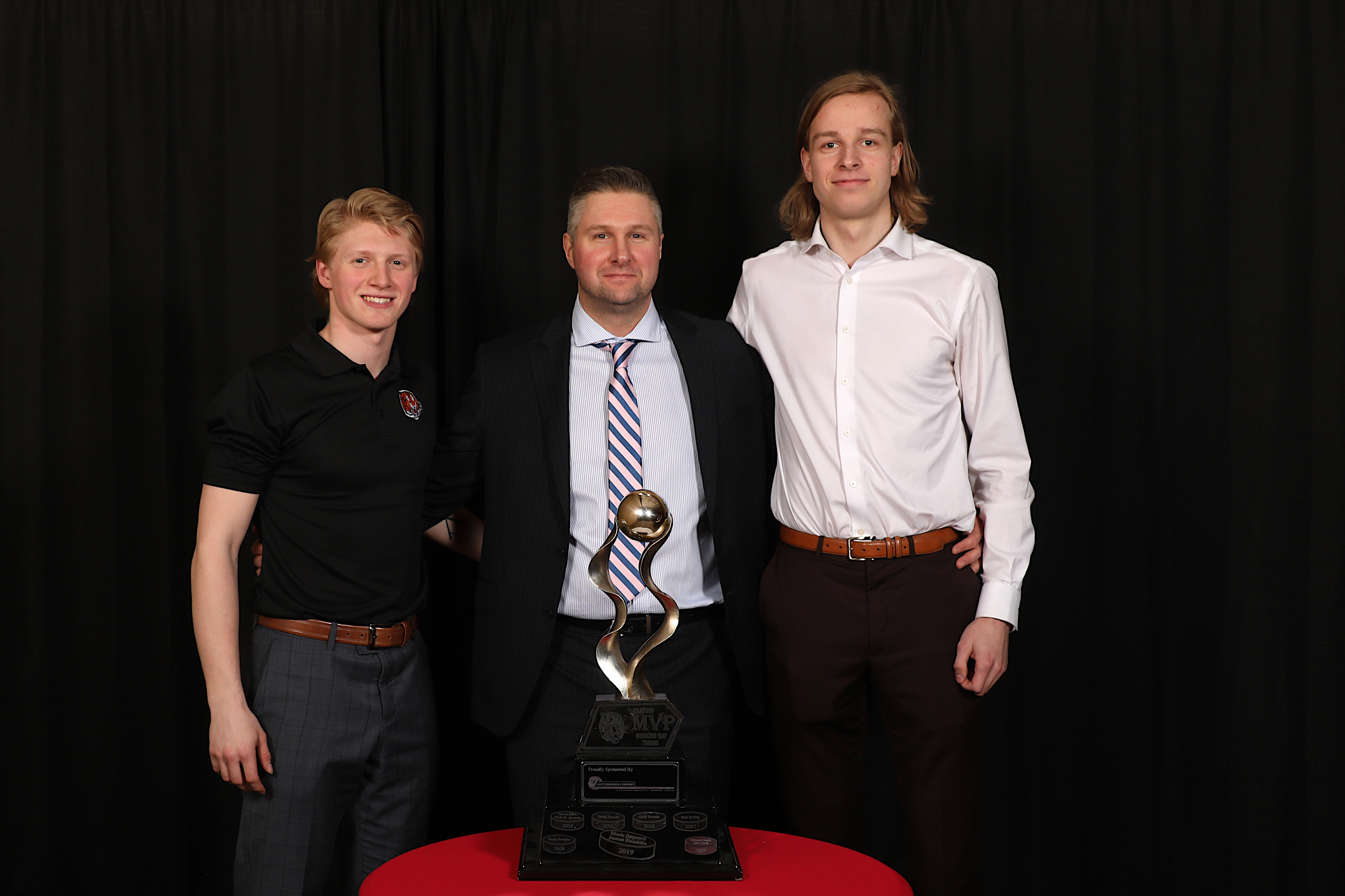 AC Ryan Smith presented the Guttormson & Co. Chartered Accountants Playoff MVP to Mads Søgaard & James Hamblin