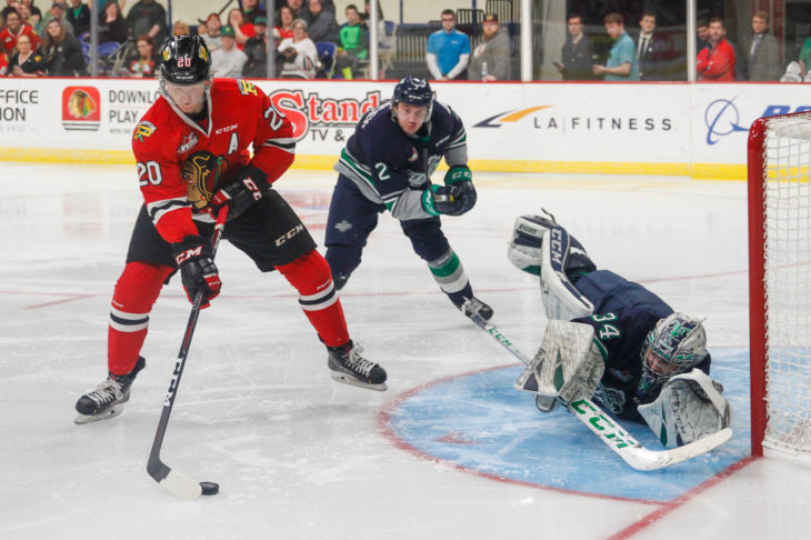 Cole Schwebius stops Joachim Blichfeld in the second period with a blocker save.