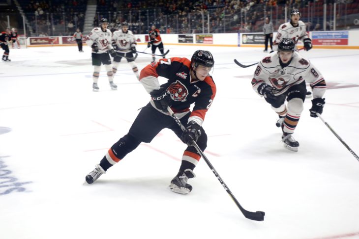 Rassell handling the puck as the Tabbies captain in 2017-18.