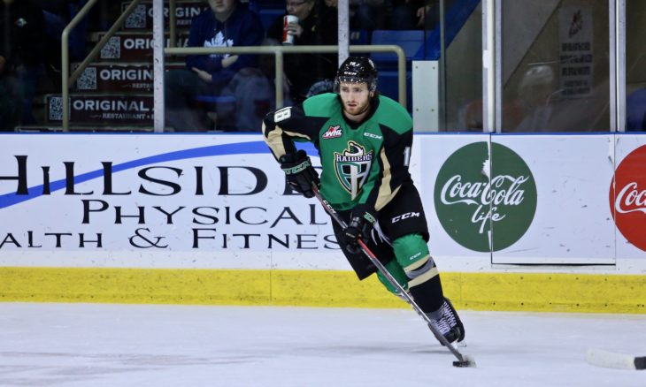 Gregor skating with Prince Albert in the 2018-19 season.